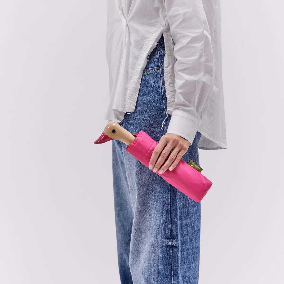 Duckhead Umbrella BonBon Closed Being Held Model Shot Original Duckhead 600x600